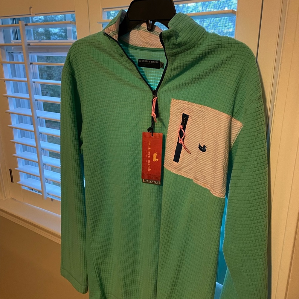 Brand new shirt. Could be for a boy or a girl. Warm pullover.